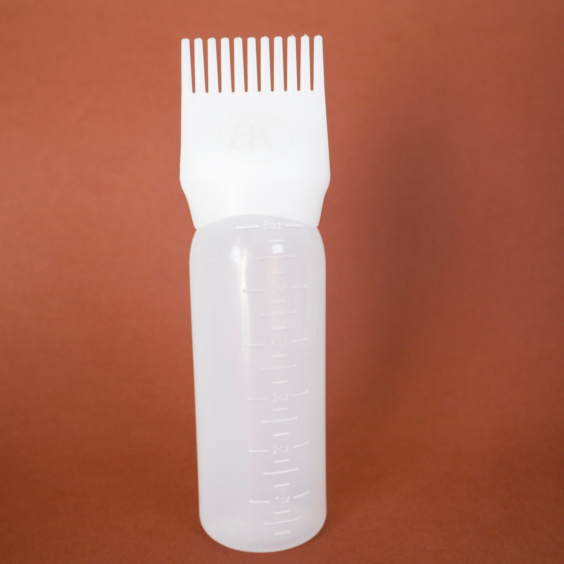 Bouteille Applicatrice à Peigne